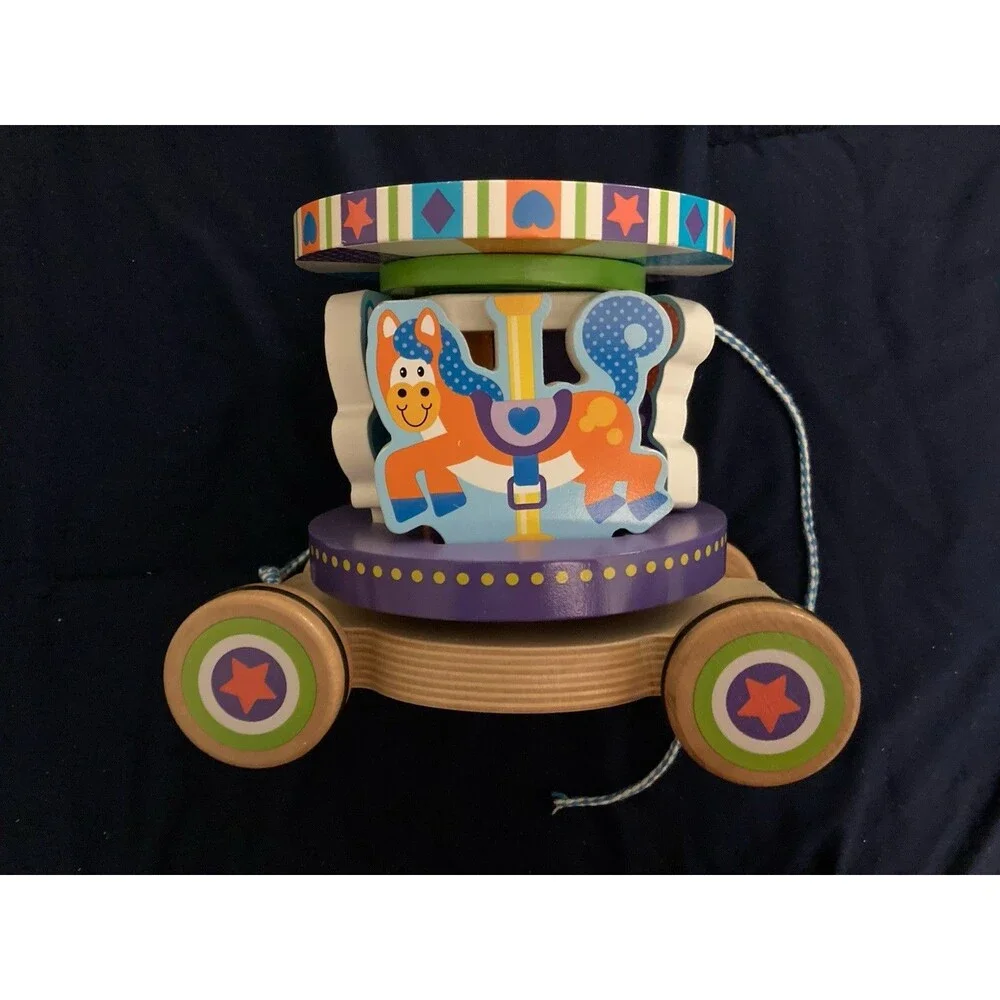 Melissa & Doug (3616) First Play Carousel Pull Toy